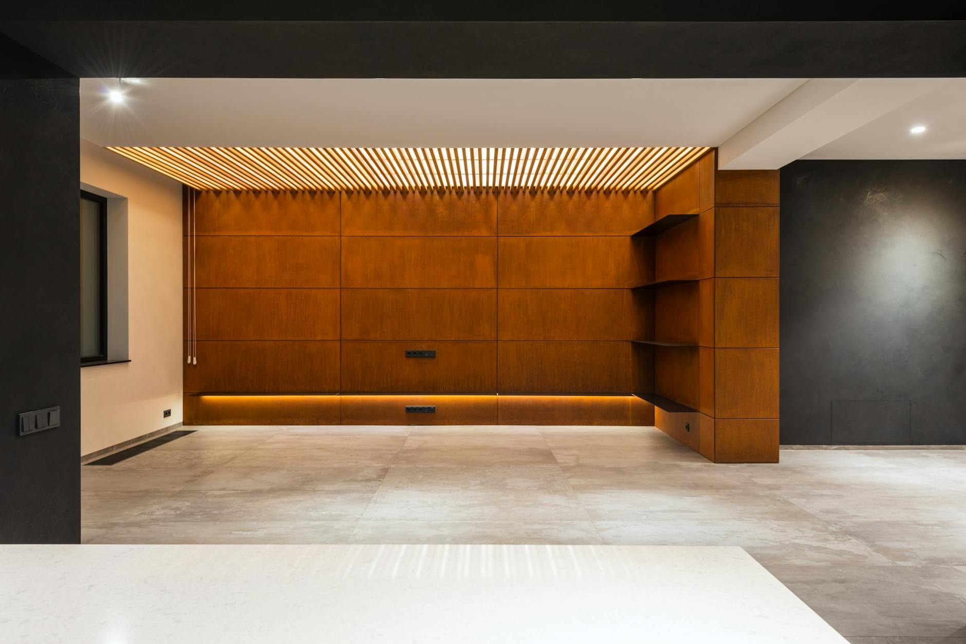 Modern niche lighting installation with ambient shelving